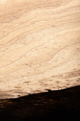 Expensive vintage furniture. The table is covered with epoxy resin and varnished. Luxury quality wood processing. Wooden table on a dark background. Black river made of epoxy resin.