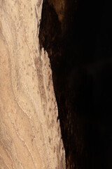 Expensive vintage furniture. The table is covered with epoxy resin and varnished. Luxury quality wood processing. Wooden table on a dark background. Black river made of epoxy resin.