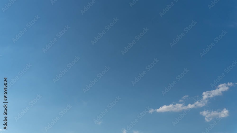 Wall mural time lapse of clouds in blue sky