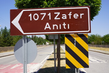 Signpost to History: The Path Leading to the 1071 Victory Monument Symbolizes the Turning Point in...