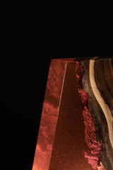 Night LED lamp made of wood and epoxy resin. Vintage lighting for a bedroom or hallway. Dark...