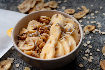 Healthy granola bowl with blueberries and strawberries.Healthy lifestyle.Healthy fruits.Kitchen in background