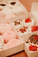 a treat of sweet delicious doughnut in sunny day at the cake shop