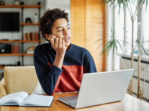 education laptop student teenager studying boy learning homework idea thinking dreaming student thoughtful looking education inspiration study young school