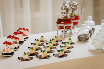 Dessert buffet with delicious sweet bakery and coffee-snack with stylish banks of lemonade and tea