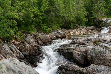 Fototapeta premium waterfall in the isfjorden fjord in norway in the woods close to massvassbu