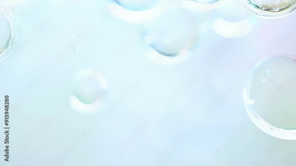 Poster An overhead shot of soap bubbles bouncing off of each other creating a playful and carefree atmosphere as they move about freely in the air.