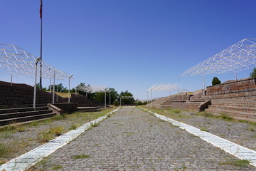 A Skeletal Canopy: The Framework of Ambition and the Steps of Progress under an Open Sky