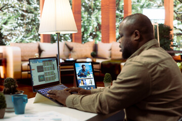 Entrepreneur communicates sales activity numbers to the investors on videocall, creating an analysis to obtain more funds. Business owner making a presentation pitch for development plans.