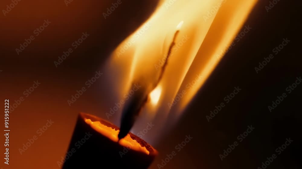 Poster the subtle movements of a torch flame captured in a closeup the gentle flickers appearing almost lik