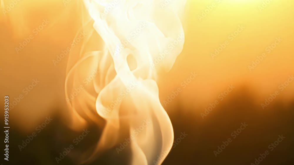 Poster a closeup shot of smoke illuminated by the sun appearing almost like a living entity as it dances an
