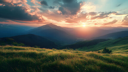 Obraz premium Beautiful nature summer scene with green grass on mountains hills and sunset cloudy sky over mountains as background looking at wide angle lens