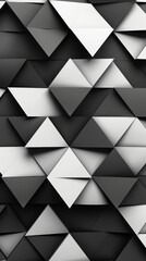 A dynamic arrangement of black and white triangles creates a textured geometric pattern on a wall