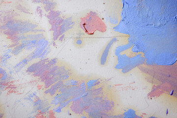 Colorful abstract texture. Smears of oil paint on an art palette. The concept of the modern school...