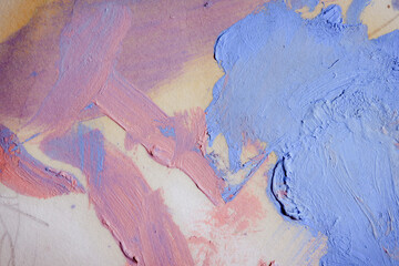 Colorful abstract texture. Smears of oil paint on an art palette. The concept of the modern school...