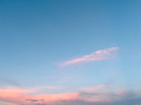 Pink clouds against a blue sky at sunset, Sarajevo, Bosnia and Herzegovina