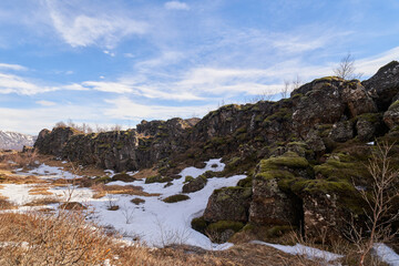 Thingvellir national park showing winter landscape with snow and rock formations