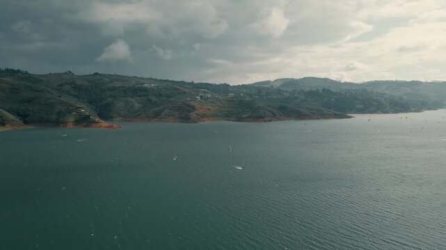 aerial view of lake calima full of kiters
