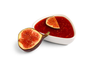Bowl of sweet fig jam on white background