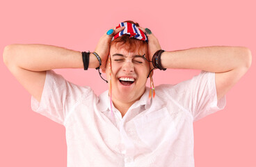 Male hippie on pink background