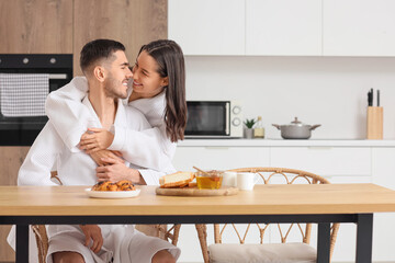 Happy young couple at home