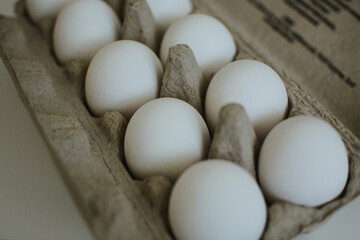 marco shooting of store bought eco friendly box of chicken eggs for cooking in the kitchen