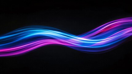 Abstract blue and pink light streaks against a black background.