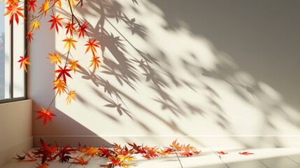 Abstract autumn scene with maple tree leaves shadow on wall.