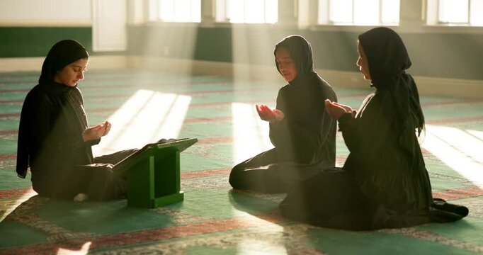 Muslim woman, praying and dua with group in mosque for teaching, learning or knowledge of god, quran or Allah. Female person or religious people in islam for madrassa, faith or blessing on carpet
