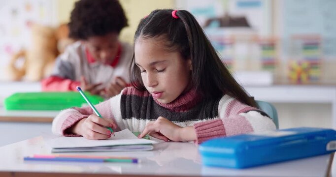 Classroom, school and kid drawing in books for lesson, language skills and learning for assessment. Education, students and young girl with notebook for writing, creativity and child development