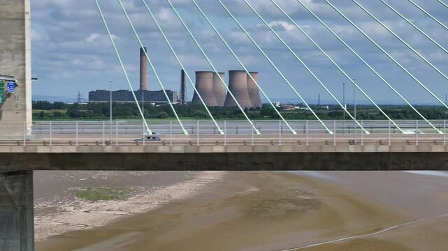 Vehicles Driving Across a Cable Stayed Bridge