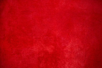 Red suede background. A thin focal part of the red background