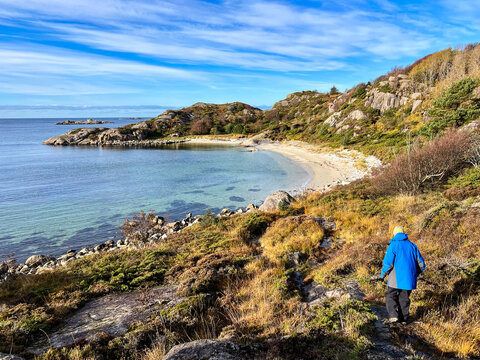 Rear view of a senior man hiking near Hellvik, Eigersund, Rogaland, Western Norway, Norway