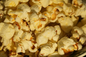 Popcorn is a beloved snack enjoyed by people of all ages around the world. It's light, crunchy, and can be flavored in countless ways, making it a versatile treat for any occasion. |爆米花