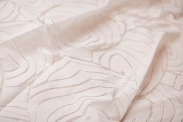 Obraz premium Smooth white fabric with a subtle embossed design. Ideal for showcasing minimalism, elegance, or home décor inspiration.