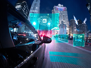 Concept of a Driverless car driving towards a futuristic cityscape, Chicago, Illinois, USA