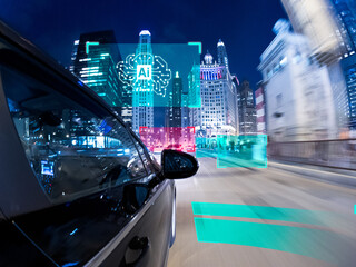 Concept of a Driverless car driving towards a futuristic cityscape, Chicago, Illinois, USA