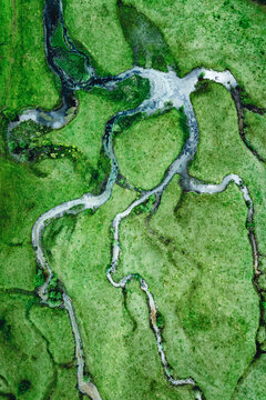 Aerial View of Meandering River in a meadow landscape, Lungau, Austrian Alps, Austria