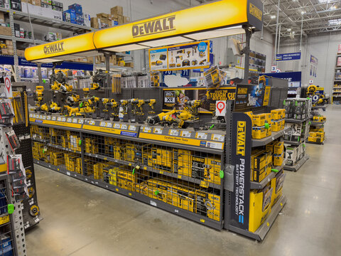 DeWalt power tools on display inside a Lowes home improvement store.