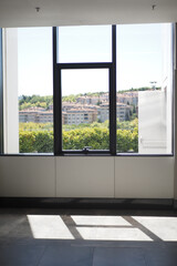 Fototapeta premium Modern building with tinted windows. Urban architecture