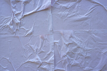 White paper poster mockup isolated on black background. Blank glued creased paper sheet texture