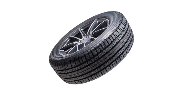 High-performance car tire with intricate tread design, ideal for automotive photography and marketing.