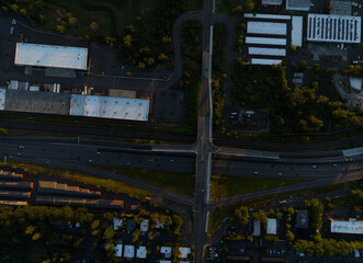 A city street view with a large overpass and a lot of traffic