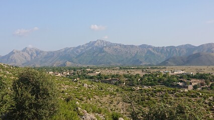 Mountainous Landscape with Village