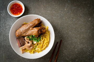 Egg noodles served dry with braised duck