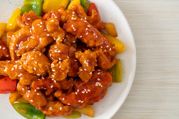 fried crispy chicken with sweet and sour sauce