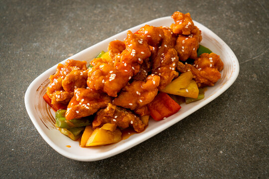 fried crispy chicken with sweet and sour sauce
