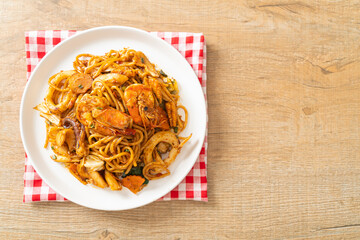 stir fried Tom Yum seafood dried spaghetti