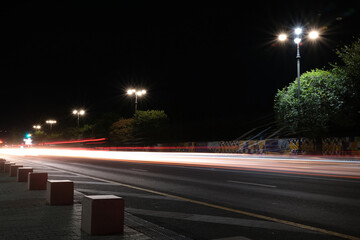 night traffic light trails in long exposure