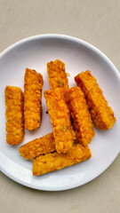 fried tempeh, a cheap source of protein